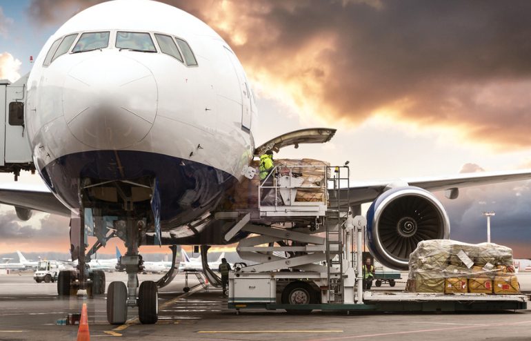 A large airplane on the tarmac, used for air shipping or air freight